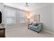 Serene bedroom with soft light and comfortable seating at 4675 Allistair Dr, Cumming, GA 30040
