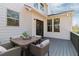 Relaxing deck with a table and chairs, perfect for enjoying the outdoors and entertaining guests at 4675 Allistair Dr, Cumming, GA 30040