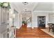 Elegant foyer with hardwood floors, neutral walls, and stylish light fixtures at 4675 Allistair Dr, Cumming, GA 30040