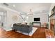 Spacious living room with hardwood floors, stylish lighting, and comfortable seating at 4675 Allistair Dr, Cumming, GA 30040