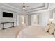 Large, bright main bedroom with a ceiling fan, flat screen television, and multiple closets at 4675 Allistair Dr, Cumming, GA 30040