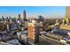 Expansive city skyline view from a high-rise building, showcasing modern architecture at 285 Centennial Olympic Park Nw Dr # 904, Atlanta, GA 30313