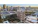Beautiful exterior shot of building with city views, and greenery nearby at 285 Centennial Olympic Park Nw Dr # 904, Atlanta, GA 30313