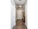 Hallway with neutral paint, a light fixture, hardwood floors and white trim and doors at 285 Centennial Olympic Park Nw Dr # 904, Atlanta, GA 30313