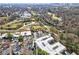 Drone shot capturing the complex, green space, and a pool, highlighting the community's amenities at 560 Dutch Valley Ne Rd # 2207, Atlanta, GA 30324