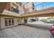 Welcoming building entrance under covered parking with easy access to lobby and amenities for residents and visitors at 560 Dutch Valley Ne Rd # 2207, Atlanta, GA 30324