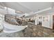 Bright lobby showcasing a spiral staircase, tile flooring, and access to the elevator and common area at 560 Dutch Valley Ne Rd # 2207, Atlanta, GA 30324