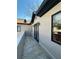 View of the balcony with stone flooring and stucco walls at 3491 Roswell Ne Rd # D, Atlanta, GA 30305