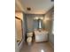 Well-maintained bathroom with a shower-tub combo, sink vanity, and tiled floors at 3491 Roswell Ne Rd # D, Atlanta, GA 30305