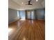 Spacious bedroom with hardwood floors and ample natural light at 3491 Roswell Ne Rd # D, Atlanta, GA 30305