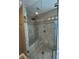 Shower stall with bench, shower head, and glass door at 3491 Roswell Ne Rd # D, Atlanta, GA 30305