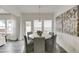 Dining area featuring a round table, chairs, and a pendant light fixture at 674 Allier Ter, Cumming, GA 30041