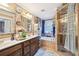 A bathroom featuring a dual sink vanity, garden tub, and walk-in shower at 1699 Boulder Walk Se Dr, Atlanta, GA 30316