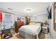 A modern bedroom featuring a gray upholstered bed and neutral walls at 1699 Boulder Walk Se Dr, Atlanta, GA 30316