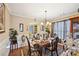 Elegant dining room showcasing hardwood floors, large windows, and table setting at 1699 Boulder Walk Se Dr, Atlanta, GA 30316