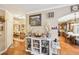 Hallway with hardwood floors leading to the kitchen and living spaces at 1699 Boulder Walk Se Dr, Atlanta, GA 30316