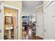 Hallway with wood floors leading to a bathroom and living spaces at 1699 Boulder Walk Se Dr, Atlanta, GA 30316