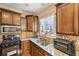 Charming kitchen with stainless steel sink, granite countertops, and ample cabinet space at 1699 Boulder Walk Se Dr, Atlanta, GA 30316