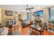 Inviting living room features hardwood floors, fireplace, and a flatscreen TV above the mantle at 1699 Boulder Walk Se Dr, Atlanta, GA 30316