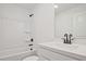 Clean bathroom with white fixtures, a shower-tub combo, and a modern vanity with matte-black accents at 175 Bluffington Way, Marietta, GA 30066