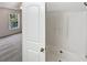 Bathroom featuring a walk-in shower and a bedroom visible through an open door at 20 Pine Canyon Sw Dr # 15, Atlanta, GA 30331