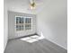 Bright bedroom featuring neutral carpet and a window providing natural light at 20 Pine Canyon Sw Dr # 15, Atlanta, GA 30331