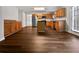 Open kitchen with wooden cabinets, stainless steel appliances, and a central island at 1882 Byrom Pkwy, Jonesboro, GA 30236