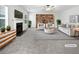 Bright living room with fireplace, built-in bookcase, and neutral-toned furniture at 1882 Byrom Pkwy, Jonesboro, GA 30236
