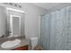 Bathroom with granite countertop, vanity and shower with decorative curtain at 2025 Shawn Wayne Se Cir, Atlanta, GA 30316