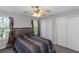 Bedroom featuring a ceiling fan, closet, natural light from the windows at 2025 Shawn Wayne Se Cir, Atlanta, GA 30316