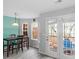 Bright dining area features natural light and a view of the deck, seamlessly connecting indoor and outdoor living at 2025 Shawn Wayne Se Cir, Atlanta, GA 30316