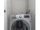 Bright laundry room showcasing a modern, front-load LG washer at 2025 Shawn Wayne Se Cir, Atlanta, GA 30316