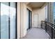 Balcony with black metal railing offering views of the surrounding high-rise buildings and the city at 3445 Stratford Ne Rd # 1101, Atlanta, GA 30326