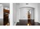 Bright living room featuring dark hardwood floors and an archway to the bathroom and kitchen at 3445 Stratford Ne Rd # 1101, Atlanta, GA 30326