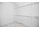 Bright, well-organized walk-in closet with multiple wire shelves at 3445 Stratford Ne Rd # 1101, Atlanta, GA 30326