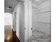 Spacious walk-in closet with marble floors and wire shelving at 3445 Stratford Ne Rd # 1101, Atlanta, GA 30326