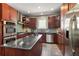 Modern kitchen featuring granite countertops and stainless steel appliances at 1244 Kingsley Ne Cir, Atlanta, GA 30324