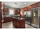 Gourmet kitchen with granite countertops, stainless steel appliances, and a wine cooler at 1244 Kingsley Ne Cir, Atlanta, GA 30324