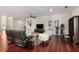 Spacious living room with hardwood floors, modern decor, and a ceiling fan at 1244 Kingsley Ne Cir, Atlanta, GA 30324