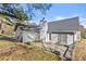 Exterior view of the back of the house featuring a patio and well-maintained siding at 1325 Richland Creek Ct, Buford, GA 30518