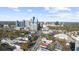 Elevated view of the city skyline, showcasing a mix of modern high-rises and lush greenery at 325 E Paces Ferry Ne Rd # 504, Atlanta, GA 30305