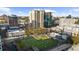 Cityscape aerial view featuring modern buildings and a lively outdoor recreation area at 325 E Paces Ferry Ne Rd # 504, Atlanta, GA 30305