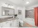 Bright bathroom features marble countertops, modern fixtures, and a separate tub and shower at 325 E Paces Ferry Ne Rd # 504, Atlanta, GA 30305