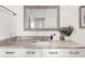 Close-up of the marble countertops, undermount sink, and chrome fixtures in the well-lit bathroom at 325 E Paces Ferry Ne Rd # 504, Atlanta, GA 30305