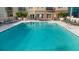 Outdoor community pool with lounge seating and direct access to a patio and building at 325 E Paces Ferry Ne Rd # 504, Atlanta, GA 30305