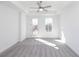 Spacious bedroom with a ceiling fan and access to the balcony at 338 Olmstead Way # 35, Alpharetta, GA 30022