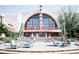 Exterior view of Regal Cinemas 12 at Avalon, with a fountain and outdoor seating area at 338 Olmstead Way # 35, Alpharetta, GA 30022