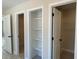 Ample closet space with built-in shelving for optimal organization and storage at 4375 Easter Lily Ave Lot 81, Buford, GA 30519