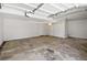 Spacious garage with ample room for parking and storage at 230 Nina Cir, Locust Grove, GA 30248