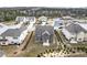Aerial view of a neighborhood featuring beautiful landscaped lawns, single Gathering homes, and mature trees at 2466 Bear Mountain St, Lithonia, GA 30058